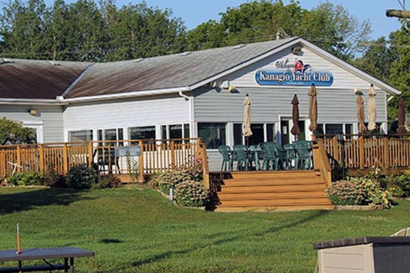 The KYC clubhouse and deck seen across the lawn