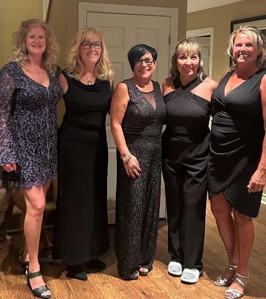 A group of ladies dressed up for the ball