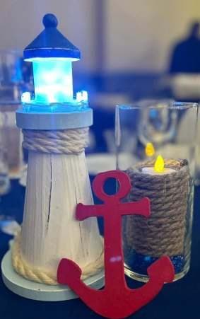 A lighthouse centrepiece on the tables