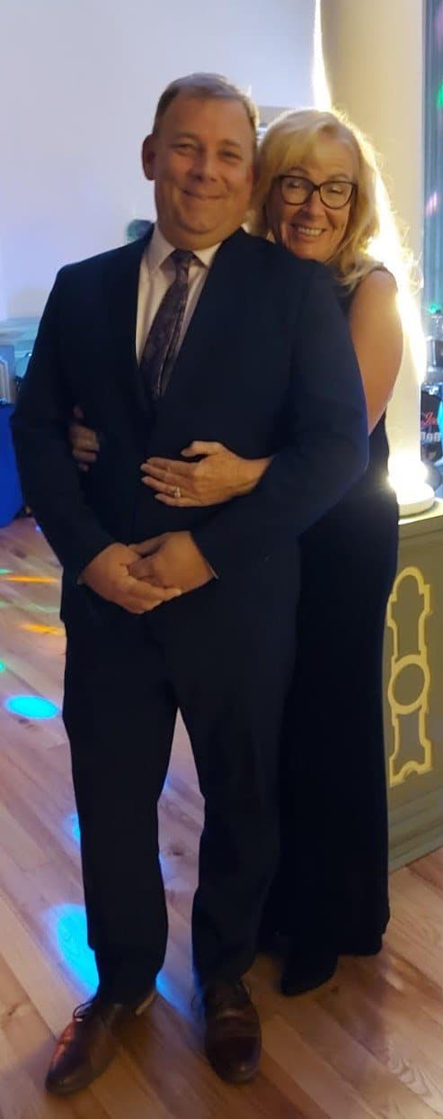 A couple posing at the ball