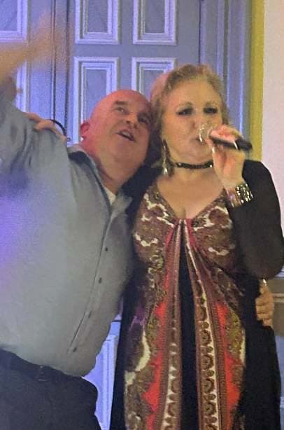 Two guests singing along