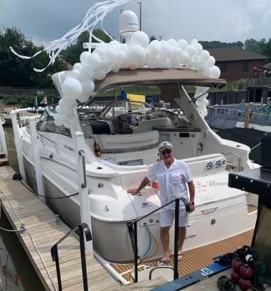 A cruiser decorated with white balloons