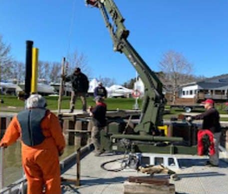 The dock crew working from the barge crane