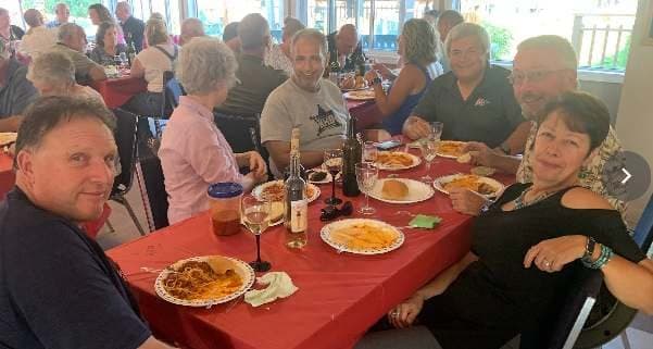 A table of friends mid-meal