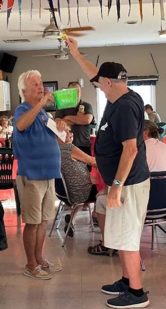 Members chatting between courses