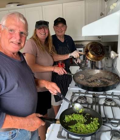 A member cooking at the clubhouse stove