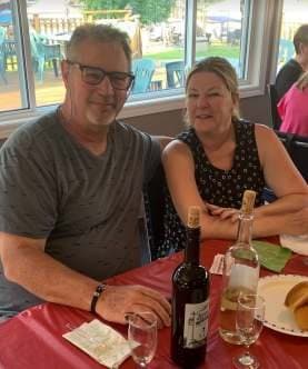 Two members at their table