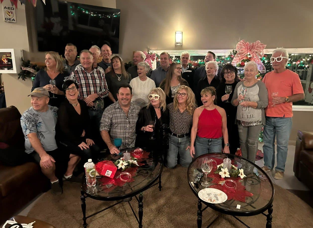 Members gathered for a group photo at the New Year’s Eve party